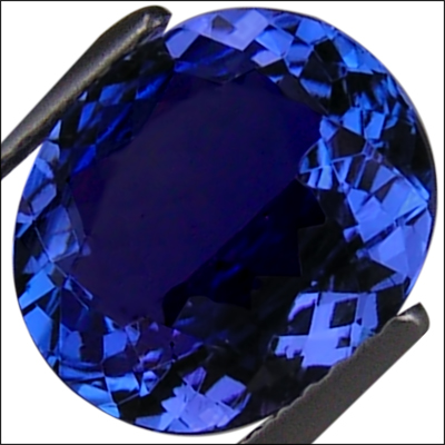 IGI Certified 5.06 ct AAAA+ Natural DBlock Tanzanite Oval Cut Deep 